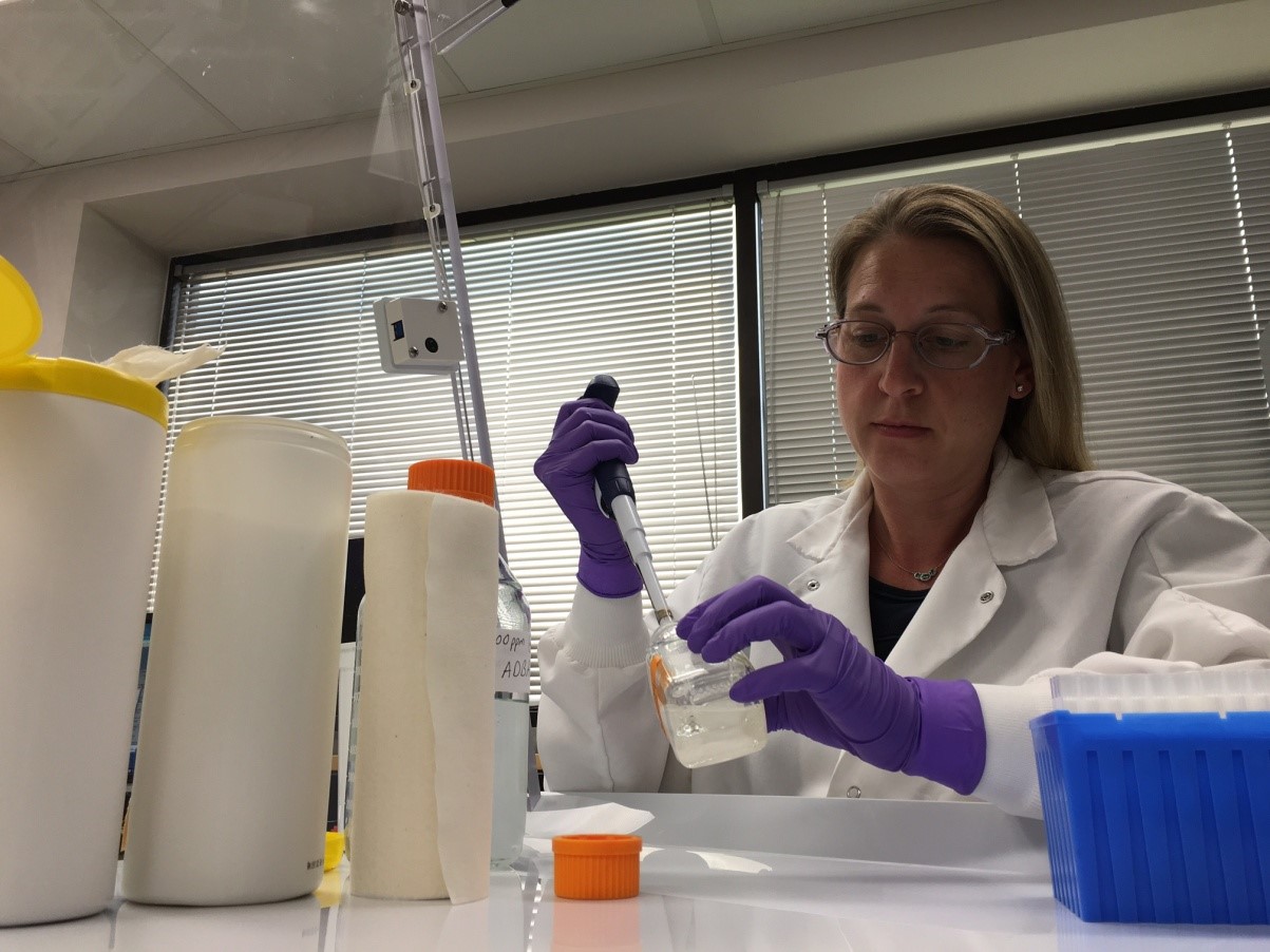 ARS scientist Crista Madison prepares optimized quat co-formulations for use with 100 per cent greige cotton disposable disinfecting wipes. The wipes successfully passed efficacy tests against Pseudomonas aeruginosa, MRSA, and VRE.